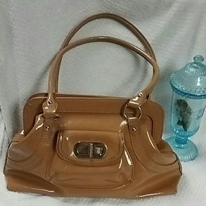 Franco Sarto tan handbag/purse clasp front
